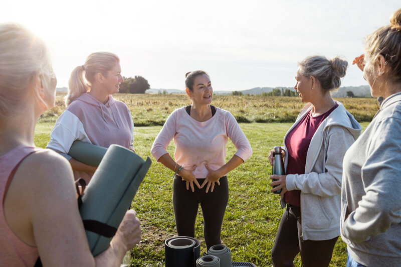 Group of women talking about kegel exercises