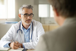 A man consults with a doctor