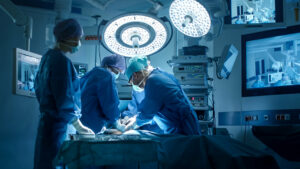 Surgeons perform in an operating room